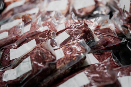 Fresh Raw Beef Steaks Vacuum Packed For Preservation In Butcher Shop, Focused On Meat Processing, Food Supply Chain, And Retail Industry